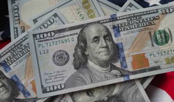 الدولار الأمريكي يسجل أسوأ أداء أسبوعي منذ يوليو الماضي