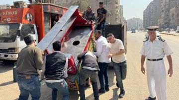 رفع 450 حالة اشغال وضبط عربات كارو تفرز المخلفات بالطريق بالجيزة