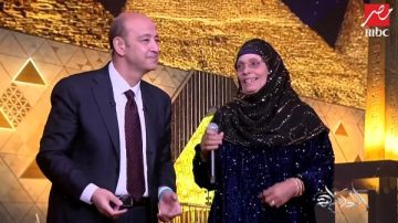 شاهد.. عمرو أديب يرقص مع الحاجة نبيلة بلبل الشرقية 