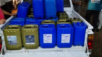 ضبط 32 جركن زيت محرك سيارات مجهولة المصدر بدمياط