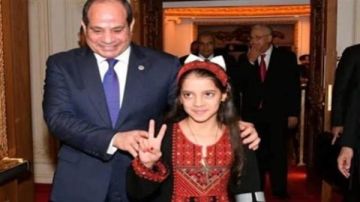 الطفلة ريتاج التي جلست بجوار الرئيس السيسي: أتمنى الاستمرار في مصر.. وإنهاء الحرب على أهلي في فلسطين الطفلة ريتاج التي جلست بجوار الرئيس السيسي: أتمنى الاستمرار في مصر.. وإنهاء الحرب على أهلي في فلسطين