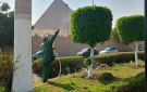 استعدادات على قدم وساق.. الجيزة ترفع كفاءة الطرق والمسطحات الخضراء حول المتحف الكبير - eg
