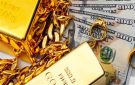 قفزة في الذهب والدولار بعد خفض الفيدرالي الأمريكي للفائدة