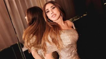 نجوى كرم بفستان لافت في أحدث جلسة تصوير صور