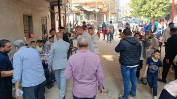 الناخبون يتوافدون علي مدارس أوسيم للإدلاء بأصواتهم