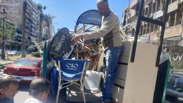 التحفظ على الإشغالات المخالفة في حي الشرق ببورسعيد صور