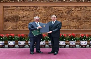 سفير مصر في الصين يسلم صورة أوراق الاعتماد إلى مساعد وزير الخارجية الصيني