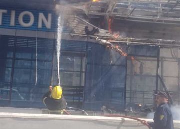 معاينة الحريق المحدود بمحطة الخصوص للأتوبيس الترددي: ماس كهربائي وراء الحادث