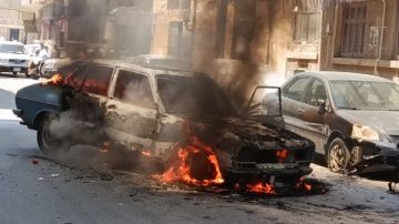 اندلاع حريق في سيارة ملاكي بمدينة أسيوط.. صور