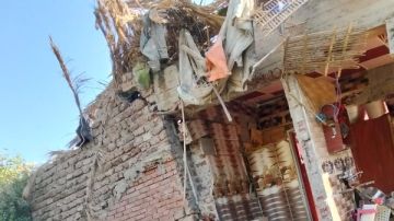 الحماية المدنية تستخرج جثمان صغيرة من أسفل أنقاض منزل أسيوط المنهار