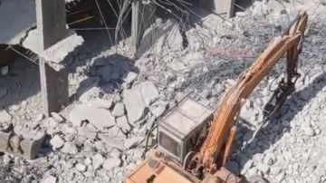 رفع 4 حفارات أعلى الأبراج المخالفة باللبيني لإزالتها بالجيزة