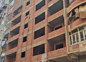 وزيرة التنمية المحلية: إزالة أدوار مخالفة في 3 عقارات بالقاهرة والجيزة