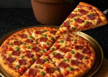 اقتصادية هتوفر معاكي.. اعرفي طريقة تحضير بيتزا الطاسة (بدون خميرة)