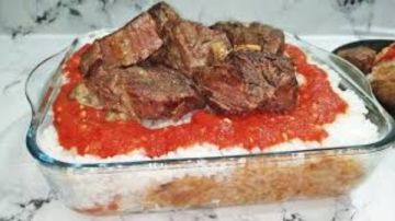 الفتة المصرية بالخل والثوم على أصولها.. أسرار التميز في المناسبات العائلية الفتة المصرية بالخل والثوم على أصولها.. أسرار التميز في المناسبات العائلية