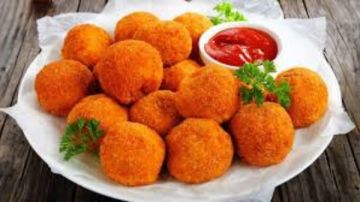كرات الأرز المحشية بالخضار والجبن.. وجبة لذيذة وسريعة للأطفال والعائلة كرات الأرز المحشية بالخضار والجبن.. وجبة لذيذة وسريعة للأطفال والعائلة