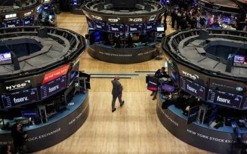 تباين أداء الأسهم الأمريكية في مستهل تعاملات اليوم