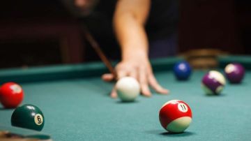 حكم التكسب من لعبة البلياردو وألعاب الكمبيوتر.. الإفتاء: حرام في هذه الحالة