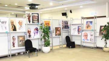 نجيب محفوظ بعيون العالم الكاريكاتير العالمي يحتفي بالأديب المصري في معرض القاهرة الدولي للكتاب نجيب محفوظ بعيون العالم الكاريكاتير العالمي يحتفي بالأديب المصري في معرض القاهرة الدولي للكتاب