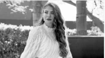 هيدي كرم تستعرض أناقتها بالأبيض في أحدث جلسة تصوير