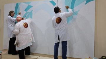 جدارية إسلامية حية تزين جناح الأزهر لأول مرة بمعرض القاهرة الدولي للكتاب جدارية إسلامية حية تزين جناح الأزهر لأول مرة بمعرض القاهرة الدولي للكتاب