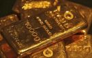 الذهب يتراجع مع صعود الدولار وترقب قرار الفيدرالي الأمريكي بشأن الفائدة - eg