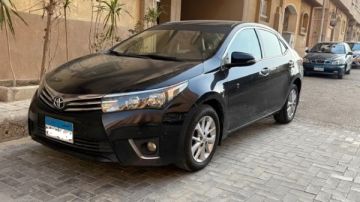 تويوتا كورولا 2014 سعرها 600 ألف جنيه تويوتا كورولا 2014 سعرها 600 ألف جنيه