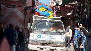 حملة لرفع الإشغالات من شارعي الشرباصي والحربي في دمياط حملة لرفع الإشغالات من شارعي الشرباصي والحربي في دمياط