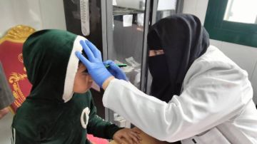 1802 خدمة طبية مجانية خلال قافلة بقرية العاقولة بكفر الشيخ صور