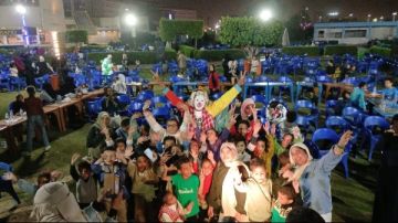 إفطار جماعى لـ 100 طفل يتيم وتوزيع قسائم شراء ملابس