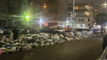 وسط استغاثة المواطنين.. قمامة تغلق شارع ترعة السواحل العمومي بإمبابة