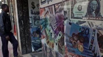 ضغوط الديون تلقي بظلال ثقيلة على الاقتصاد المصري في عام حاسم ضغوط الديون تلقي بظلال ثقيلة على الاقتصاد المصري في عام حاسم