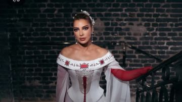 أصالة تخطف الأنظار بإطلالة أنيقة باللونين الأبيض والأحمر على إنستجرام شاهد