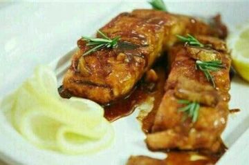 السمك الفيليه المشوي.. وجبة صحية بتتبيلة شهية وطريقة سهلة في المنزل