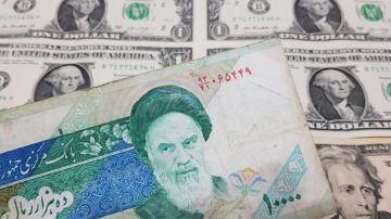 انخفاض قيمة الريال الإيراني إلى مستوى قياسي جديد انخفاض قيمة الريال الإيراني إلى مستوى قياسي جديد
