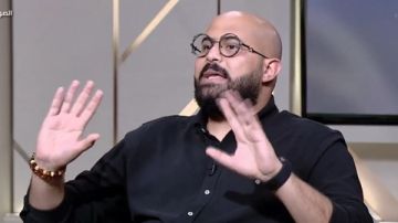 عمر الجمل ممازحا لميس الحديدي: بكسب كويس.. باين على قميصي عمر الجمل ممازحا لميس الحديدي: بكسب كويس.. باين على قميصي