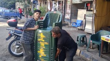 حملات مكثفة لرفع الإشغالات والتعديات بشوارع العجوزة حملات مكثفة لرفع الإشغالات والتعديات بشوارع العجوزة