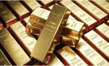 الذهب يصعد مع تراجع الدولار لكن تبدد آمال خفض الفائدة يحد من المكاسب