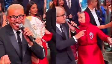فيديو.. سيدة تقتحم حفل عمرو دياب لتقبل يده ورد فعله يشعل المنصات