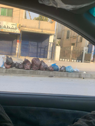 أهالي الزرقاء يشتكون من تراكم القمامة في الوسط التجاري ومحيطه - صور