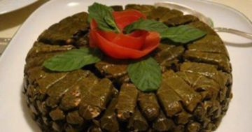 طريقة عمل طاجن ورق العنب بدبس الرمان طريقة عمل طاجن ورق العنب بدبس الرمان