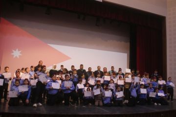 تخريج دورة الشرطي الصغير في الزرقاء تخريج دورة الشرطي الصغير في الزرقاء