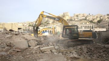 أمانة عمان تهدم مبنيين بشارع الطلياني لتطوير وسط البلد