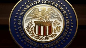 انخفاض الأسهم والسندات بعد قرار الاحتياطي الفيدرالي