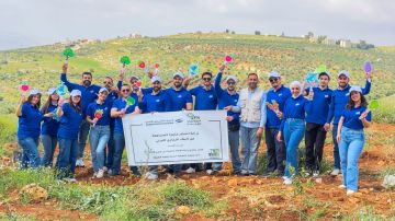 التجاري الأردني يزرع الأشجار المثمرة في يوم الأرض العالمي