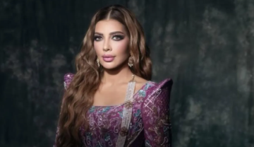 أصالة تخلع حذاءها على المسرح وتفاجئ الجمهور: هذا ليس شعري أصالة تخلع حذاءها على المسرح وتفاجئ الجمهور: هذا ليس شعري