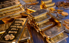 الدولار يضغط على اسعار الذهب ويدفعها نحو خسارة اسبوعية ثالثة