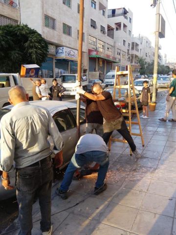 حملة لإزالة العوائق والاعتداءات على الشوارع والأرصفة في الزرقاء حملة لإزالة العوائق والاعتداءات على الشوارع والأرصفة في الزرقاء