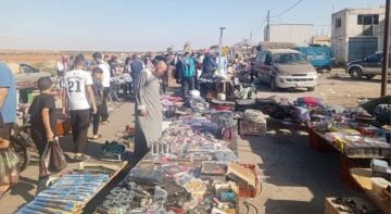 سوق الجمعة .. سوق شعبي أم خطر مفتوح على الطريق الدولي ؟ سوق الجمعة .. سوق شعبي أم خطر مفتوح على الطريق الدولي ؟