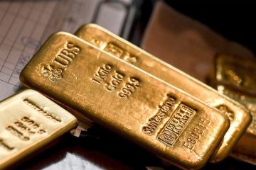 الذهب يقلص مكاسبه... والفضة تستفيد