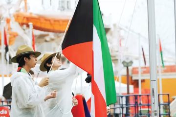 رفع علم الكويت في القرية الرياضية قبل الآسياد رفع علم الكويت في القرية الرياضية قبل الآسياد